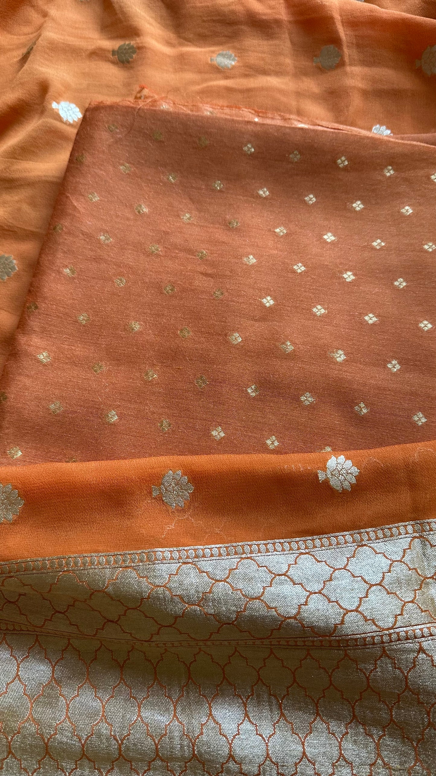 Orange kadhwa moonga silk kurta, moonga silk bottom and georgette dupatta.