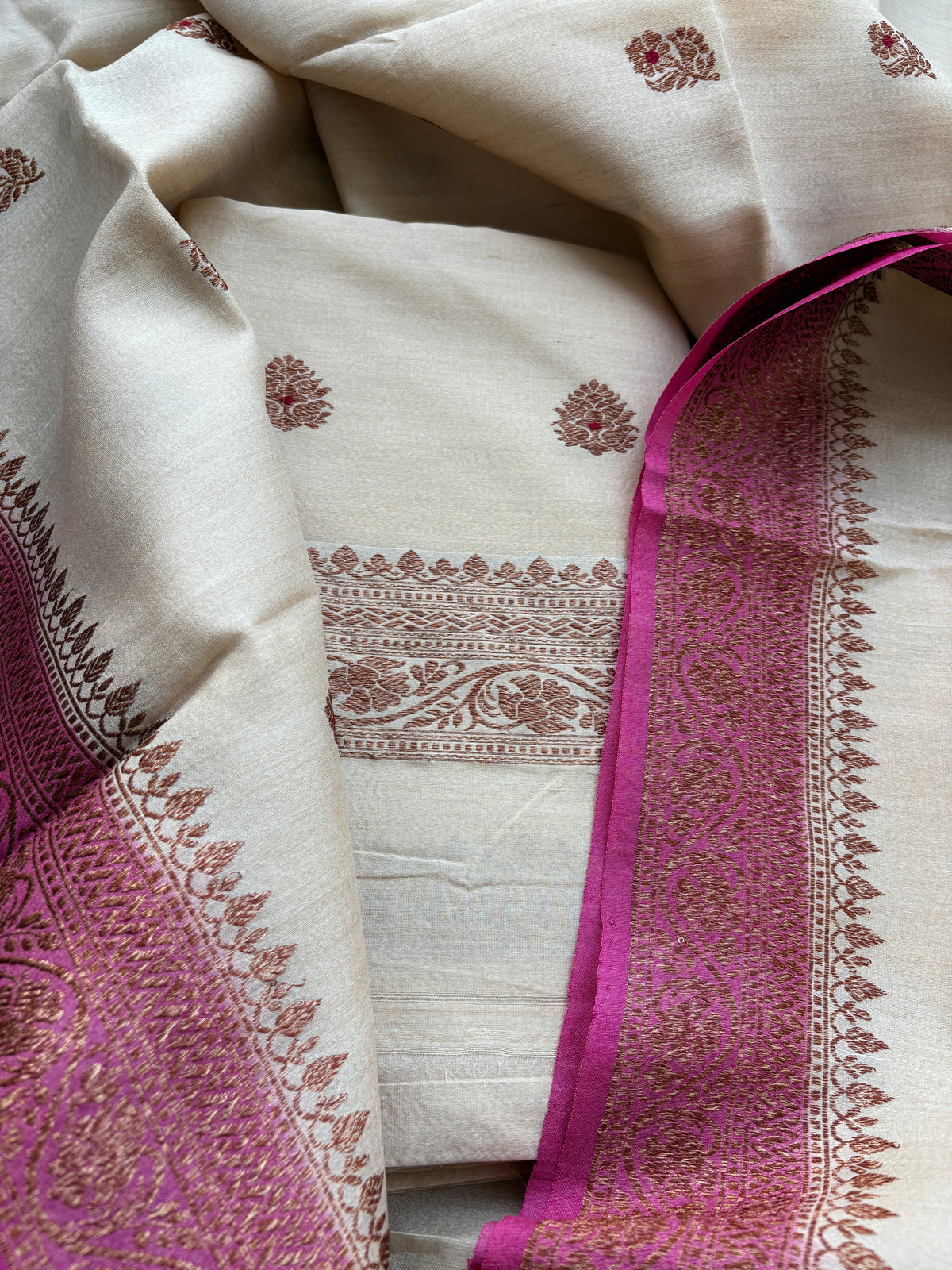 Cream tussar silk suit with pink shaded dupatta