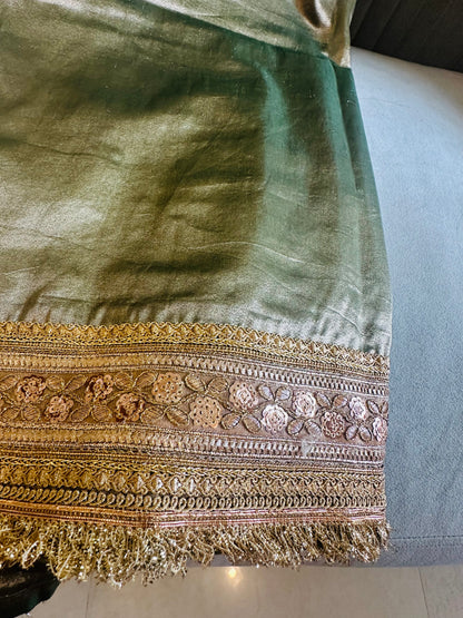 Green premium tissue saree with elaborated border