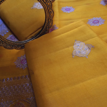 Yellow chiniya silk kurta, meenadar dupatta and plain bottom