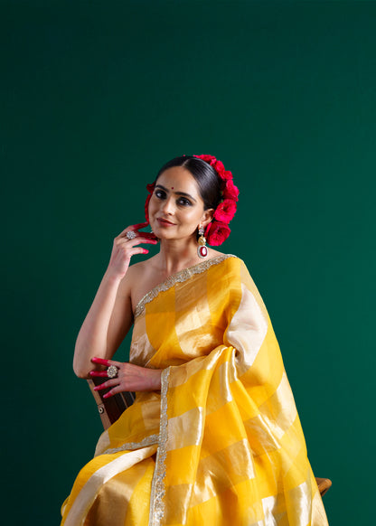 Yellow handloom kora silk saree.