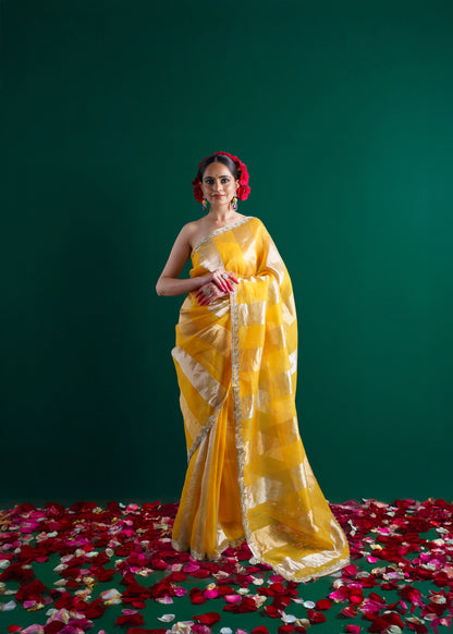 Yellow handloom kora silk saree.