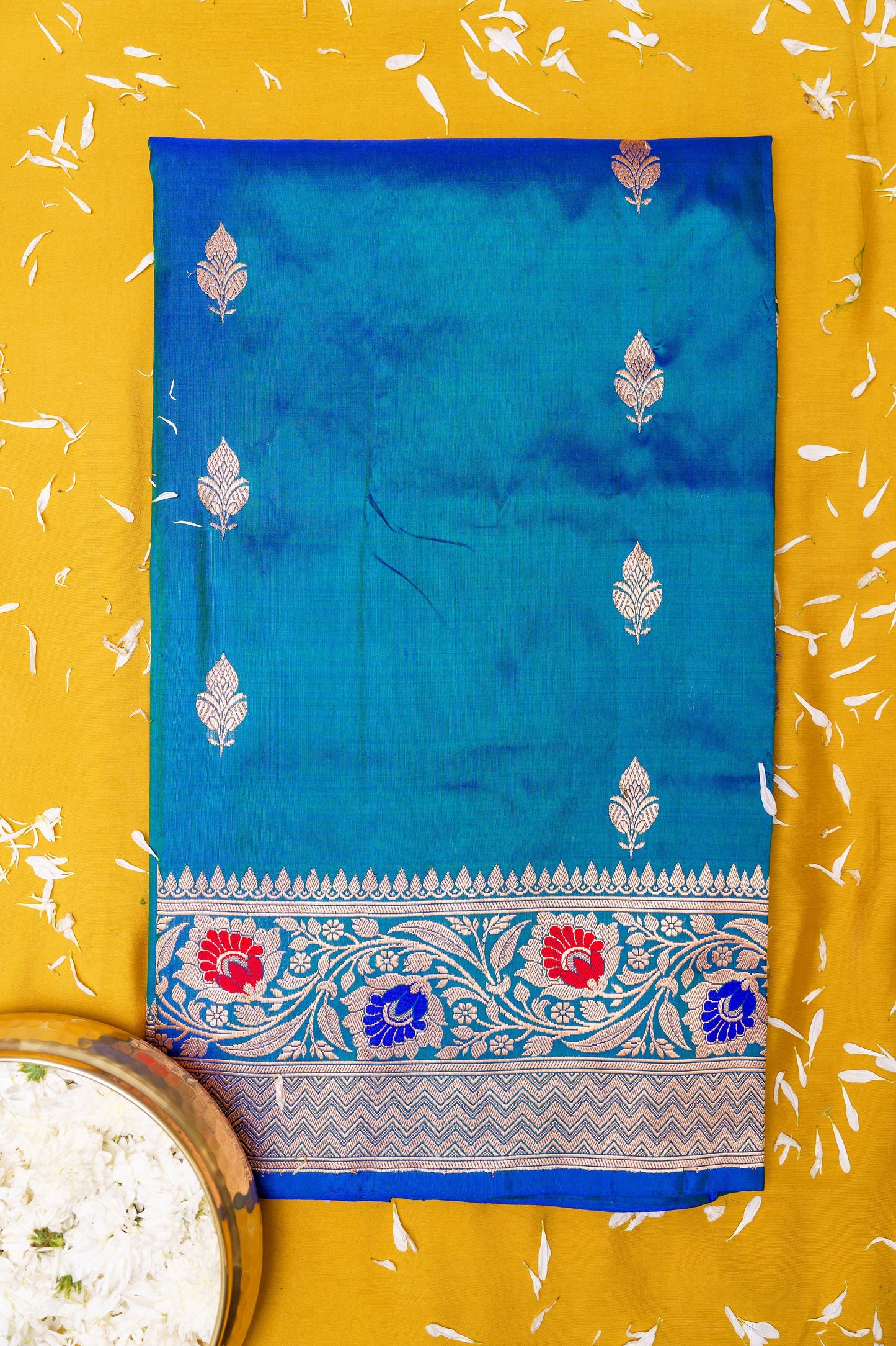 Blue dhoop chau katan silk saree.