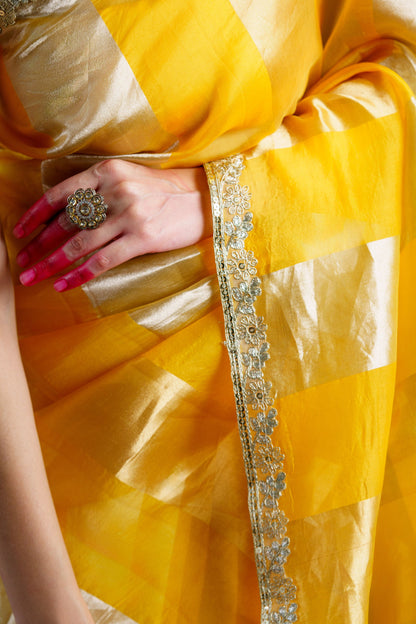 Yellow handloom kora silk saree.